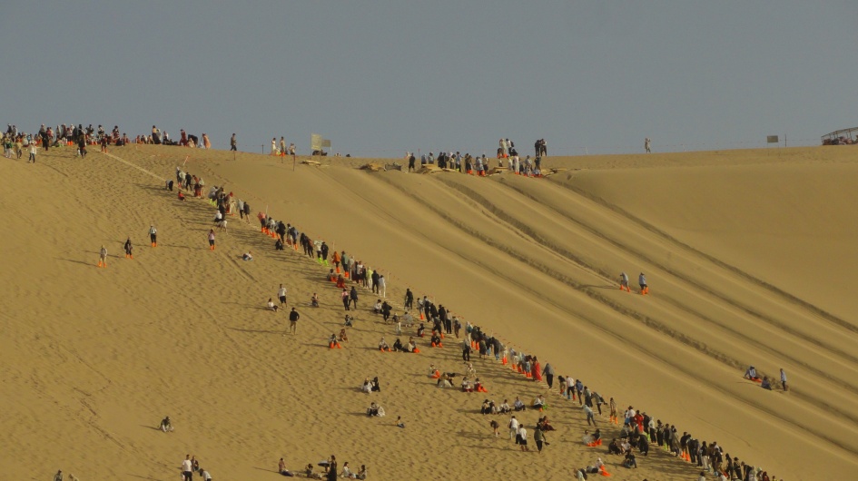 Students Climbing Mingsha Mountain