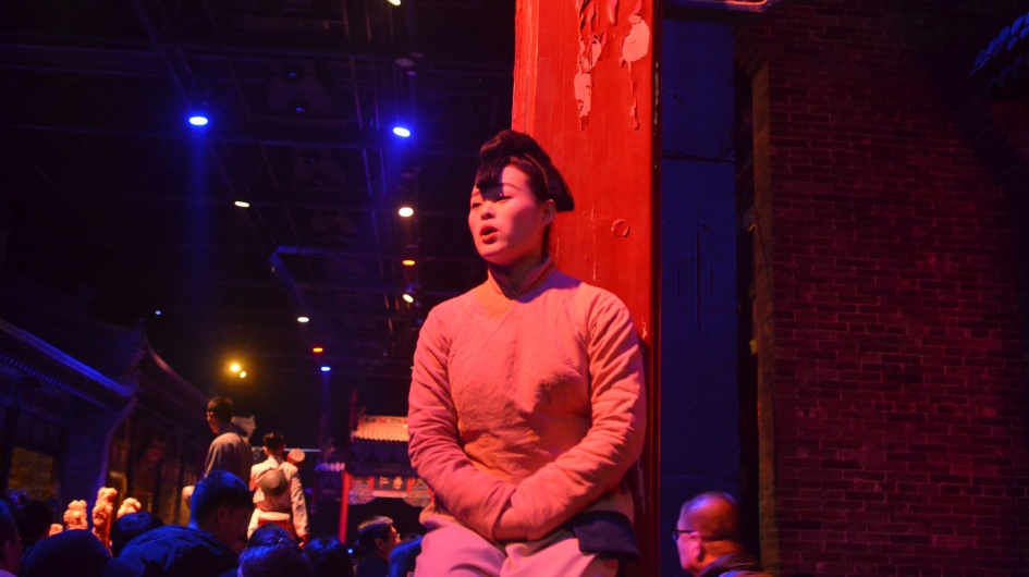 Actress performing next to the audience in the Encore Pingyao Show.